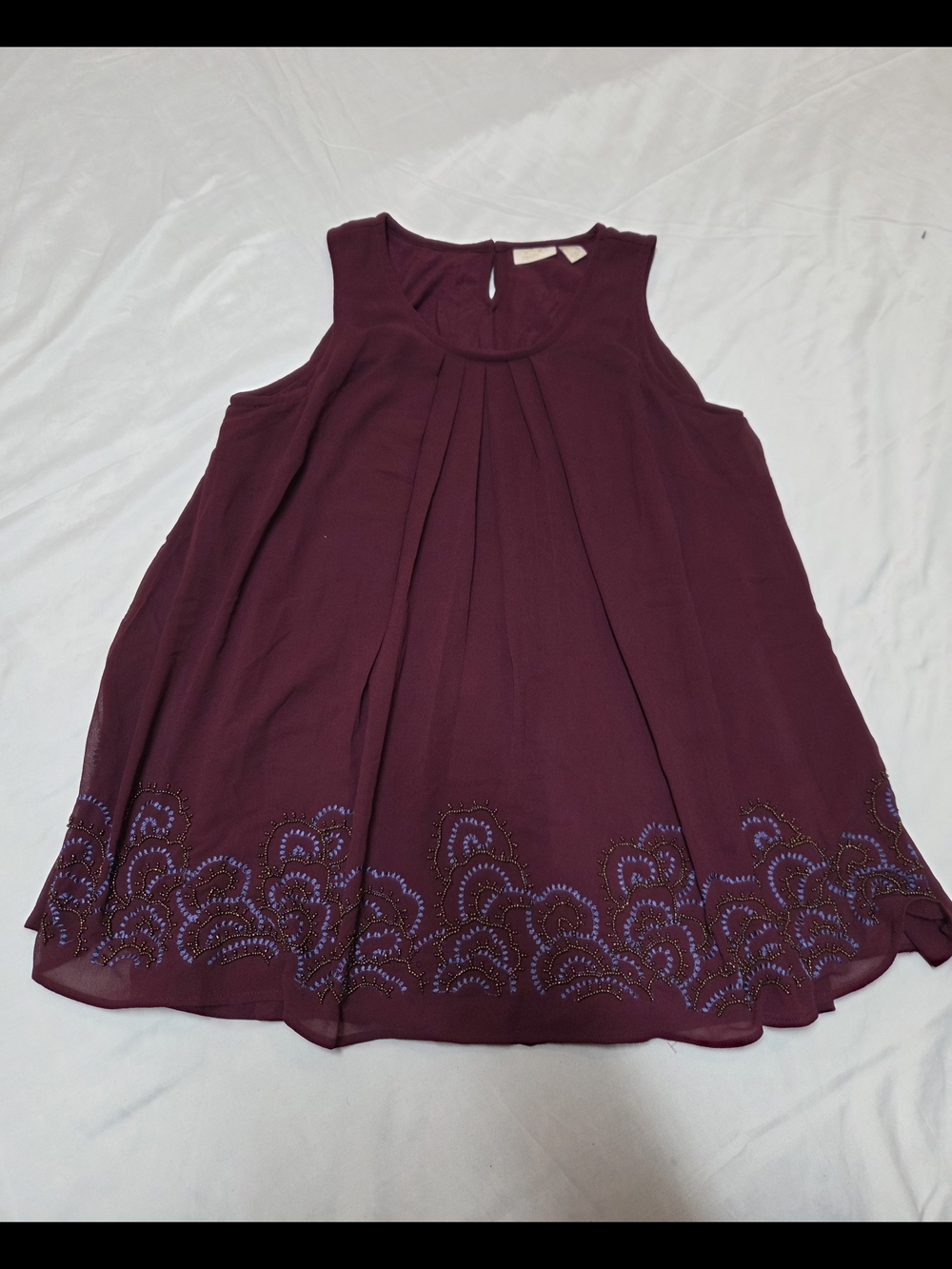 Lavish Maroon Sleeveless Embroidered Hem Dress